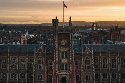 Slight top down angle of front of QUB Lanyon Building at dusk